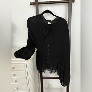 Wilfred sheer pleated black blouse with pussybow detail at neck. From aritzia.